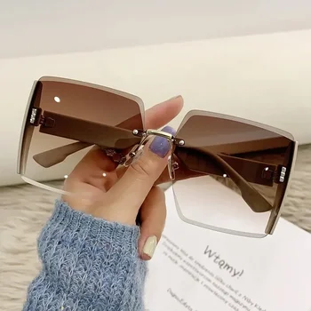 Нови слънчеви очила-очила без рамки, устойчиви на uv, за модерните жени, популярни в Интернет Слънчеви очила в същия стил